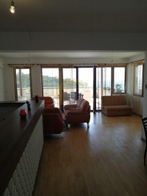 A four bedroom apartment for sale in Budva with a sea view