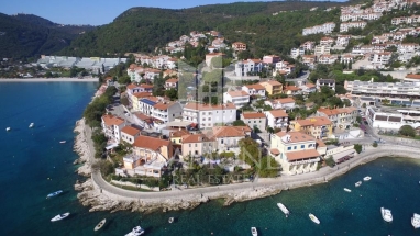 Rabac, residential and commercial building first row to the sea