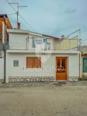 House with potential in the center of Brtonigla