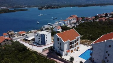 New 3-bedroom apartment with a sea view and big terrace in Bogišići