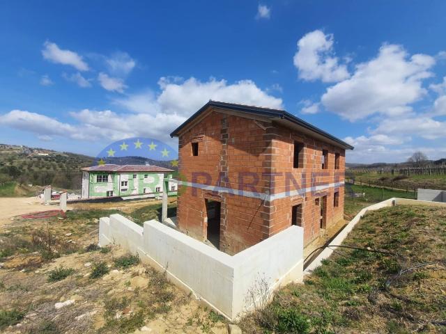 Modern house under construction near Buja