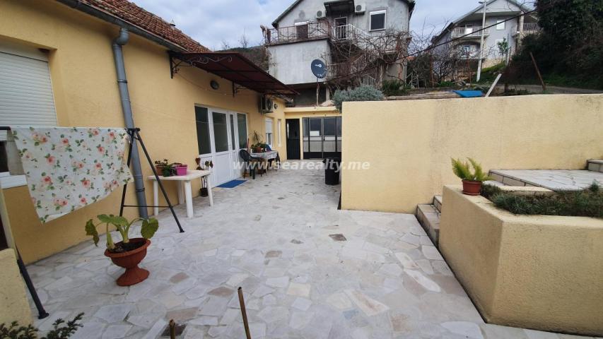 House for Sale with Two Apartments - Ideal for Investment or Living: