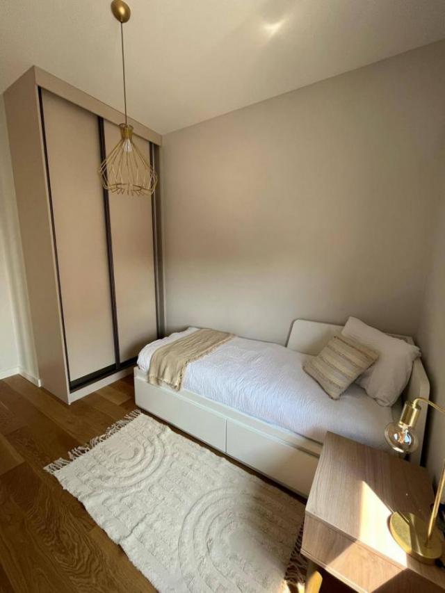 For rent in a new building with an elevator, a comfortable and interesting two-bedroom apartment wit