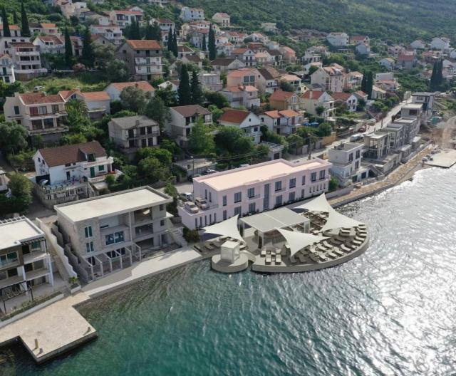 Tivat - land with a project for a 4-star mini-hotel on the first line to the sea