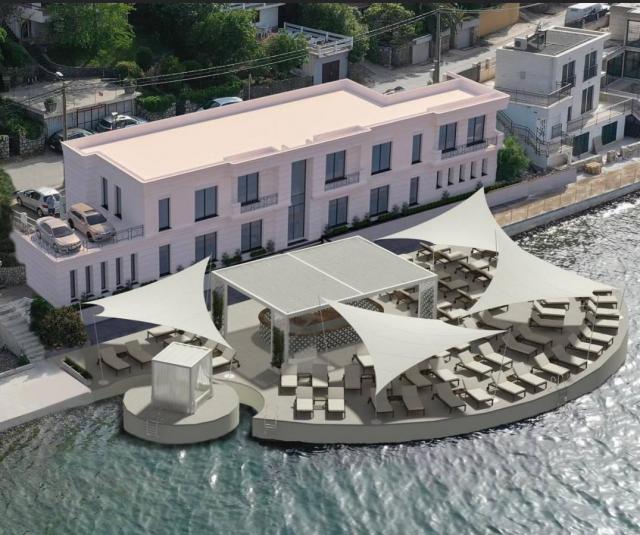 Tivat - land with a project for a 4-star mini-hotel on the first line to the sea