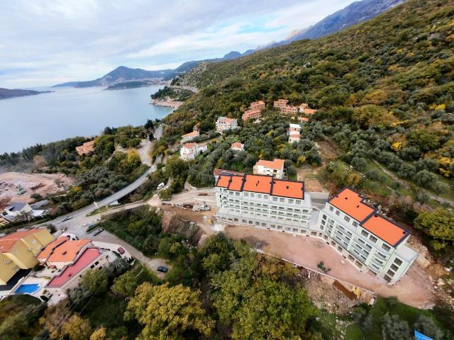Prodaja dvosobnog stana 108m² u novogradnji sa pogledom na more, parkingom i oslobođenjem od poreza 