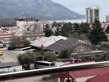 Modern 2-bedroom apartment with a sea view in Budva for sale