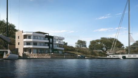 NEW BUILDING 1ST ROW TO THE SEA WITH SWIMMING POOL