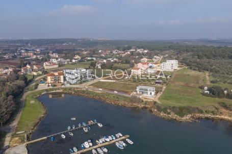 Istra, Pomer, građevinsko zemljište 520 m², 80 m od mora, pogled na more